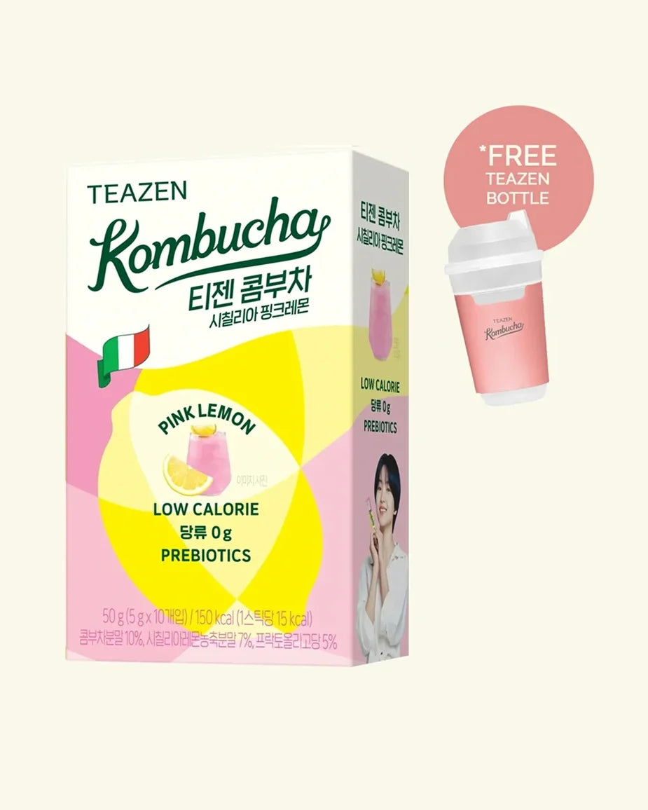 A box of Teazen Kombucha Pink Lemon flavor, featuring a pink and yellow design with a small Italian flag graphic, a 'FREE PLANTY BERRY CUPS' promotional badge, and a small photo of a woman on the side panel, all set against a solid cream background.