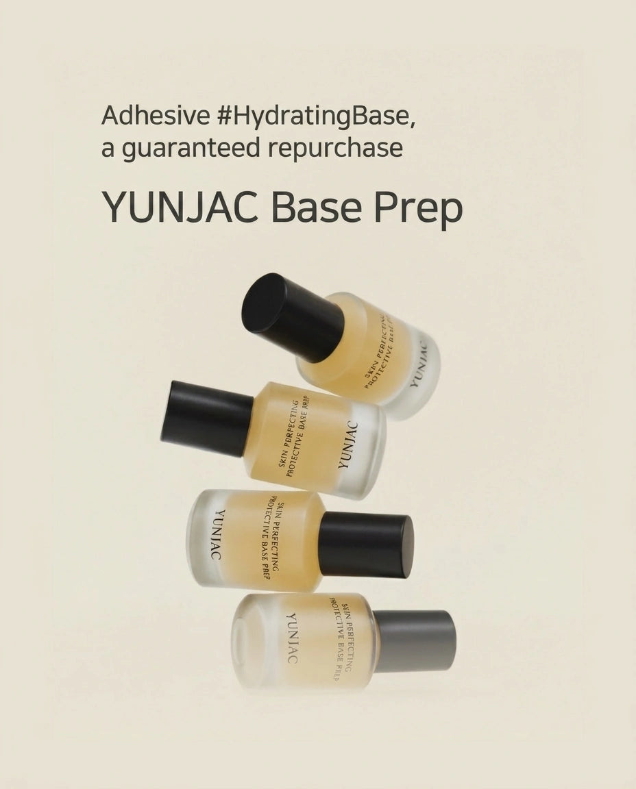 Four YUNJAC Base Prep adhesive bottles arranged diagonally on a light beige background with promotional text reading 'Adhesive #HydratingBase, a guaranteed repurchase YUNJAC Base Prep'.