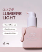Bloom Glow Essence Sun Cream SPF 50+ in a pale pink rectangular bottle with a white pump dispenser, shown on a soft pink background with promotional text reading 'GLOW LUMIÈRE LIGHT' and feature callouts.