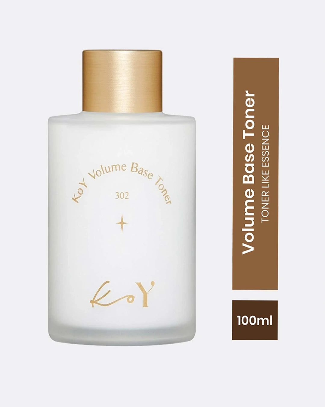 A frosted glass bottle of KoY Volume Base Toner with a metallic gold cap, shown next to a vertical brown label indicating 'Volume Base Toner' and '100ml'.