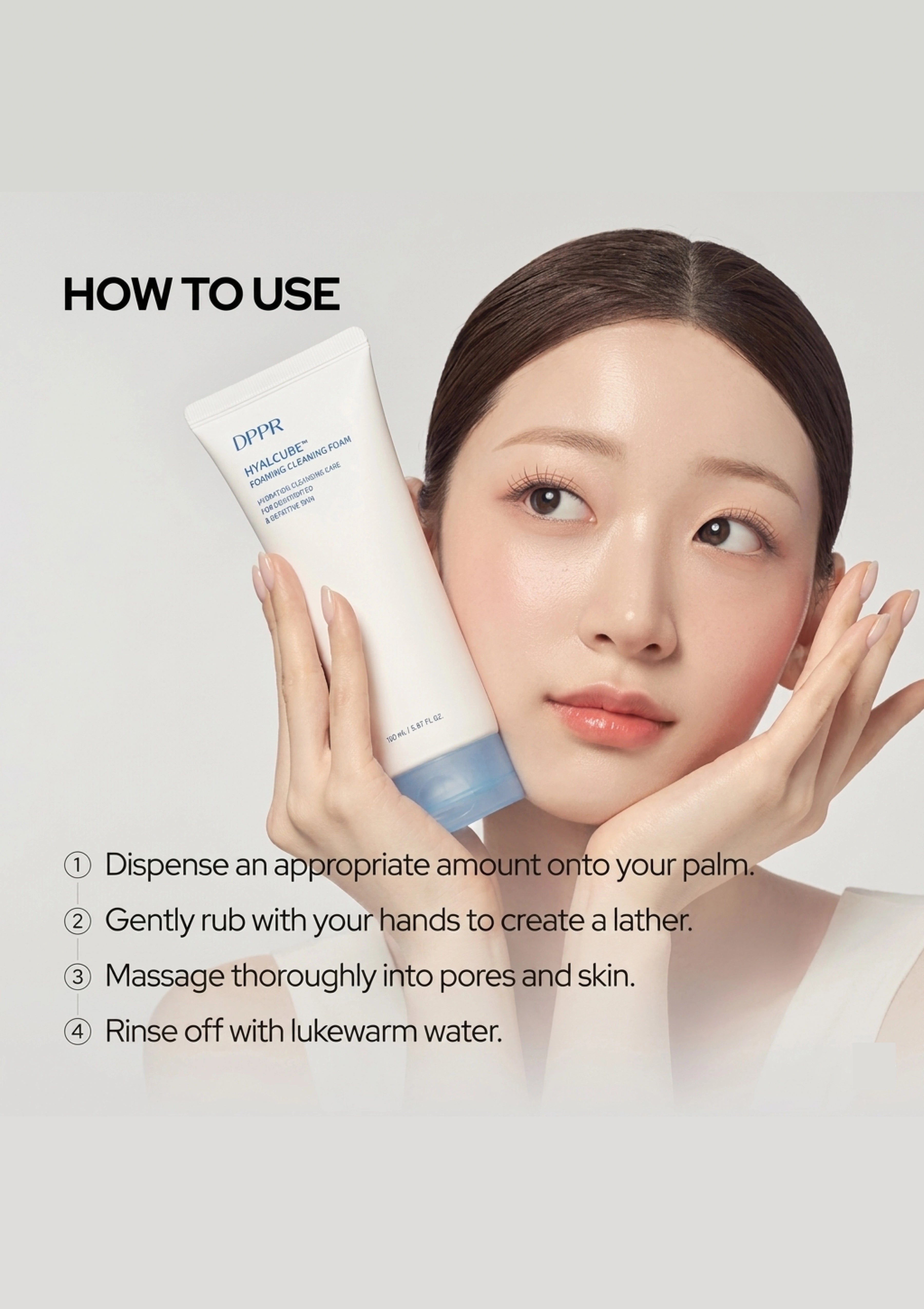 Woman holding a skincare product with usage instructions on a light gray background