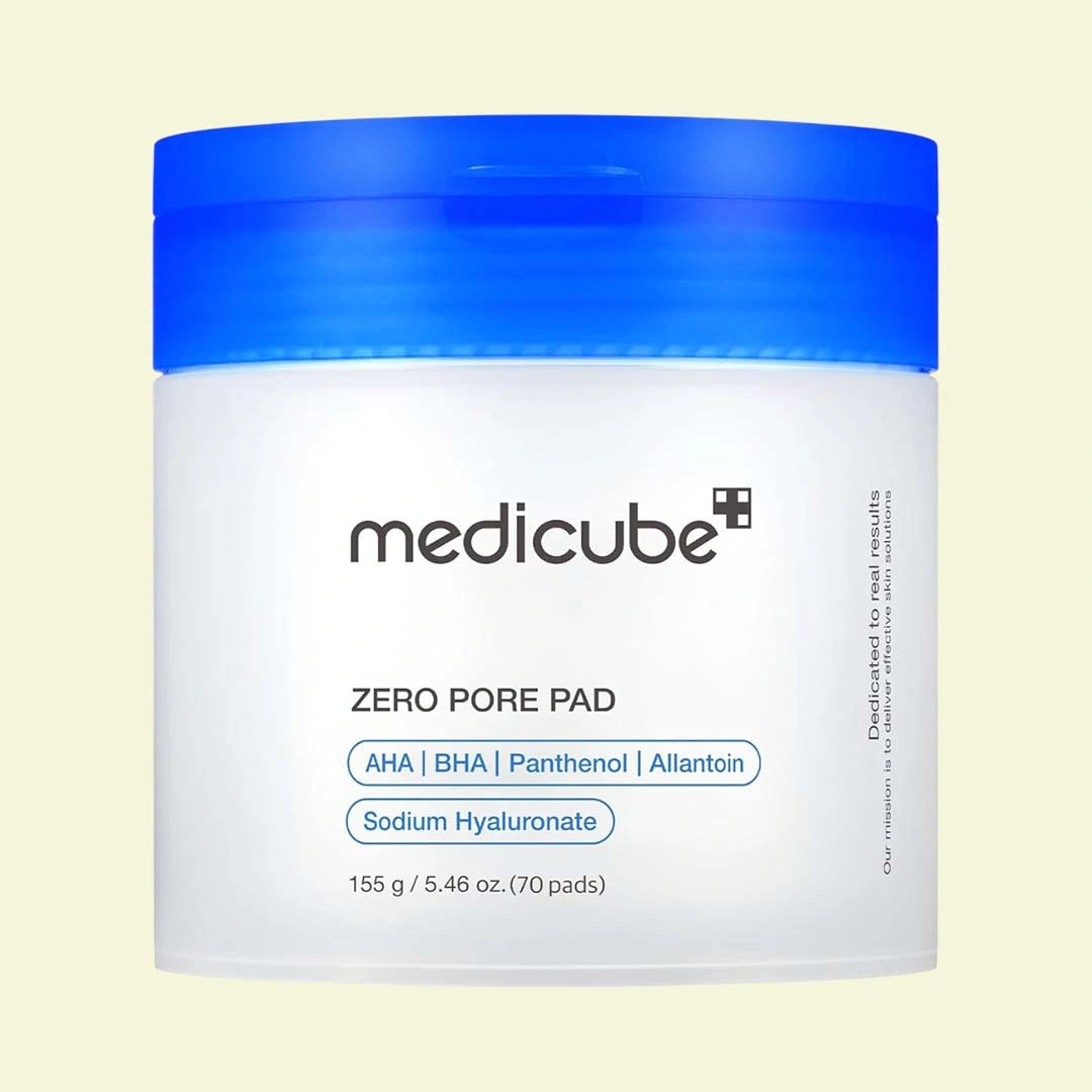 Medicube Zero Pore Pad container with blue lid on a beige background