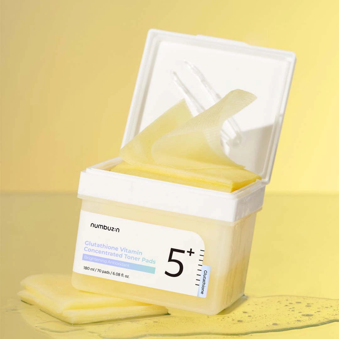Container of Numbout toner pads with a yellow background