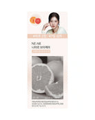 A vertical skincare packaging card for NEAR 아이언 브이게어 (Iron B550) featuring a model, citrus fruit illustrations, and a grayscale photo of sliced grapefruit, with Korean text on a pale pink background.